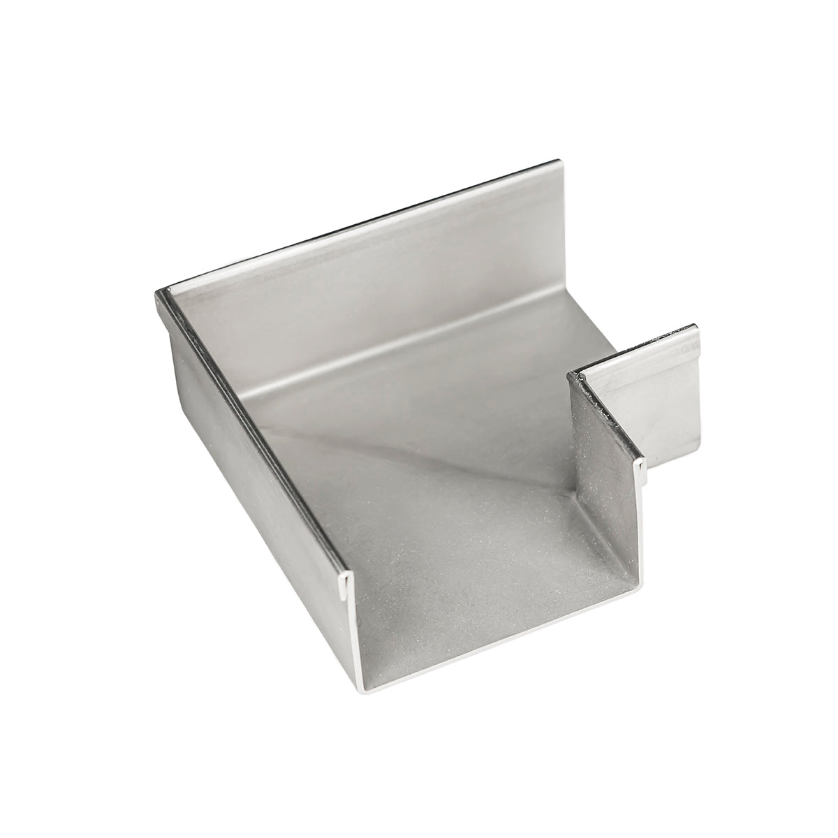 Satin stainless steel linear drain component with angled walls and side outlet port.