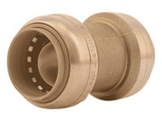 Brass push coupling with 1" connection ports, showing internal grip rings and coupling mechanism from two angles.