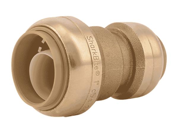 Brass push-fit reducing coupling with 1" connection on left side and 3/4" on right side.