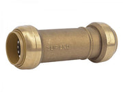 Brass push slip coupling with cylindrical body and grip rings on both ends, marked "SLIP END".