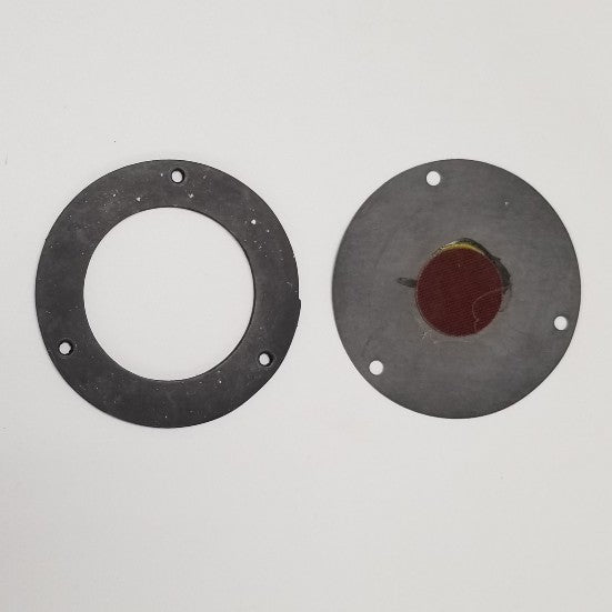 Two circular black rubber gaskets with mounting holes; left gasket has hollow center, right gasket features red diaphragm ins