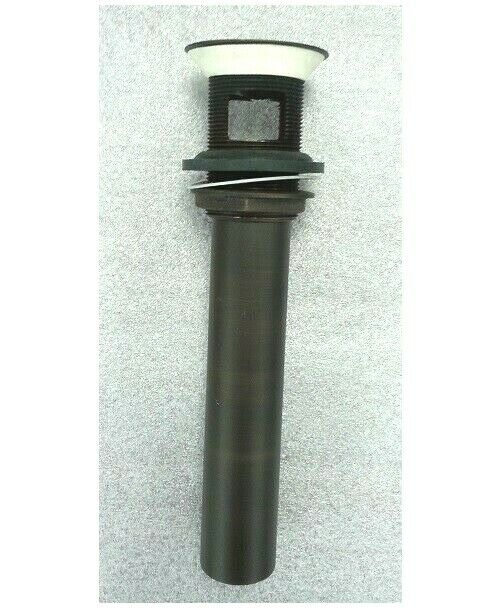 Antique bronze grid drain assembly with overflow holes and white ceramic collar cap.