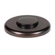 Oil rubbed bronze decorative air switch push button with circular base and domed center button.
