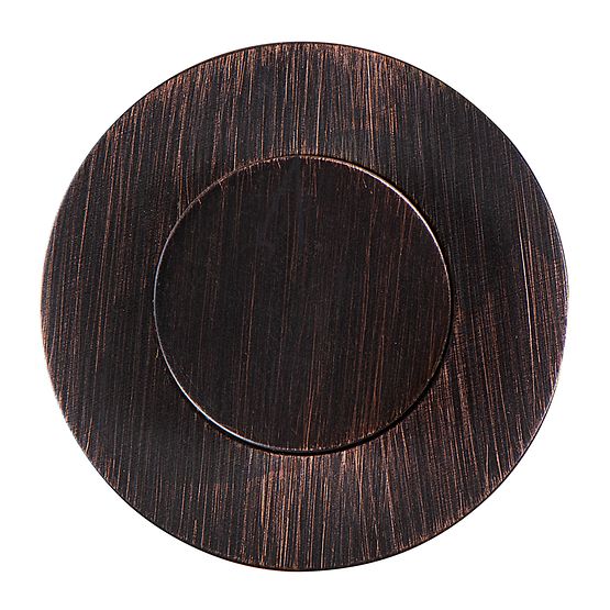 Oil-rubbed bronze circular air switch push button with brushed finish and recessed center button.