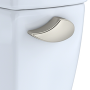 Brushed nickel curved trip lever mounted on white toilet tank.