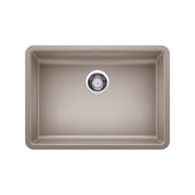 Truffle-colored single undermount kitchen sink with rounded corners and chrome drain strainer.