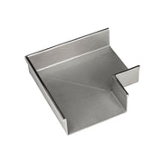 Satin stainless steel linear drain component with sloped interior basin and side outlet connection.