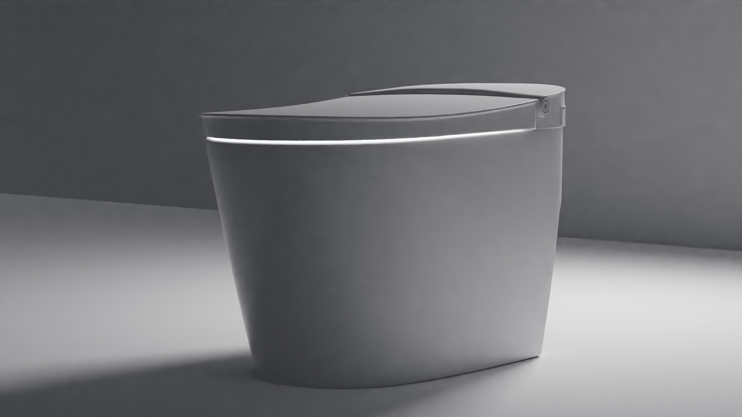 White one-piece tankless toilet with curved bowl, integrated seat, and side-mounted control panel.