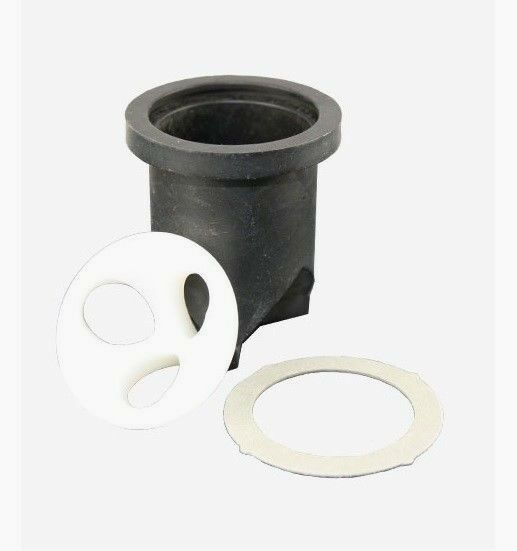 Dark gray vacuum breaker body with white rubber seal components and cream-colored ring gasket.