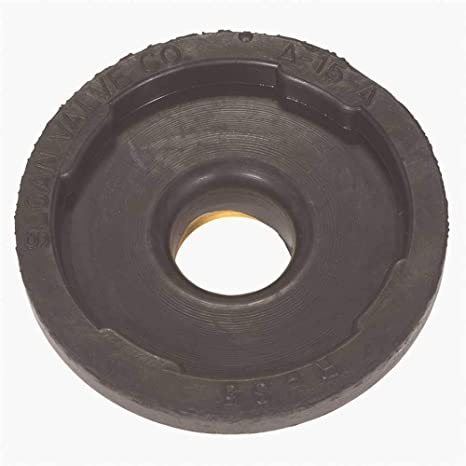 Dark gray rubber disc with central brass-colored hole and textured outer rim.