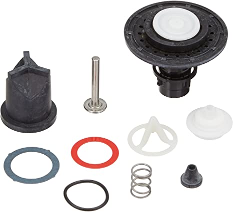 Toilet repair kit components including rubber seals, springs, metal rod, and valve parts.