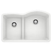 White undermount kitchen sink with two unequal basins and chrome drains, viewed from above.