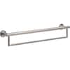 Stainless steel towel bar with assist grip mounted on wall with round end caps.