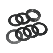 Eight black rubber shim rings arranged in two groups on white background.