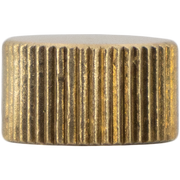 Brass bleeder cap with vertical ribbed texture and flat top.