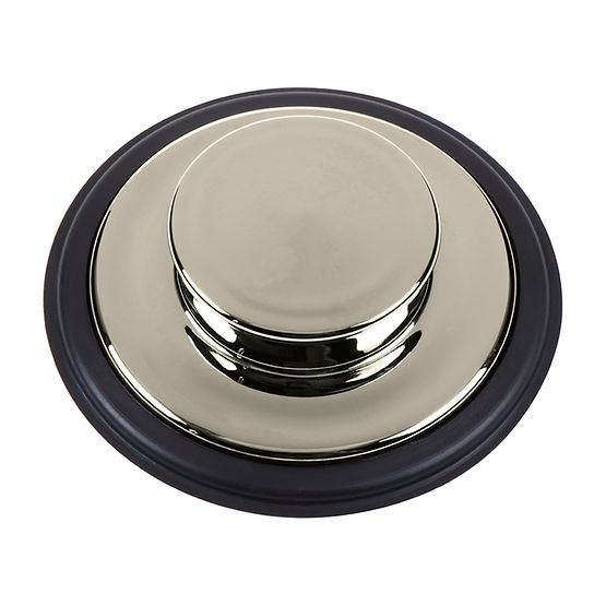 Polished nickel sink stopper with domed top and black rubber ring base, shown from above.
