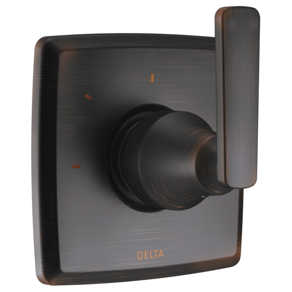 Delta Ashlyn diverter trim in oil-rubbed bronze with round rotational handle and square backplate.