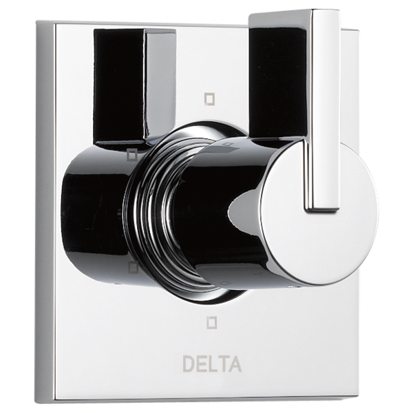 Chrome and black Delta Vero diverter trim with round handle and rectangular escutcheon plate mounted on white background.