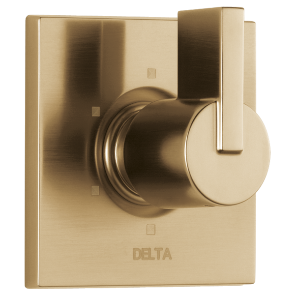 Champagne bronze Delta Vero diverter trim with round handle and rectangular backplate featuring three port outlets.
