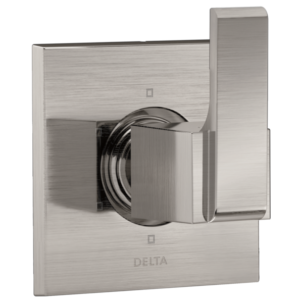 Brushed nickel Delta diverter valve trim with single lever handle mounted on square wall plate.