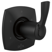 Matte black shower diverter trim with cylindrical handle and square mounting plate.