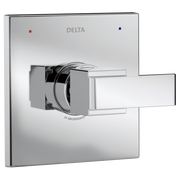 Delta Ara chrome square trim valve with lever handle and temperature indicator dots on brushed metal plate.
