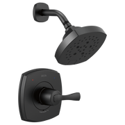 Black Delta Stryke shower valve with curved arm, square showerhead, and lever handle mounted on wall plate.