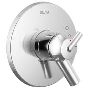 Chrome Delta Trinsic monitor valve trim with single lever handle and temperature indicator dots on round escutcheon plate.