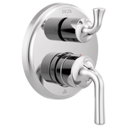Chrome Delta shower valve trim with two lever handles and integrated diverter on oval escutcheon plate.