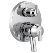 Delta Trinsic chrome shower valve trim with two handles and integrated diverter control mounted on oval escutcheon plate.