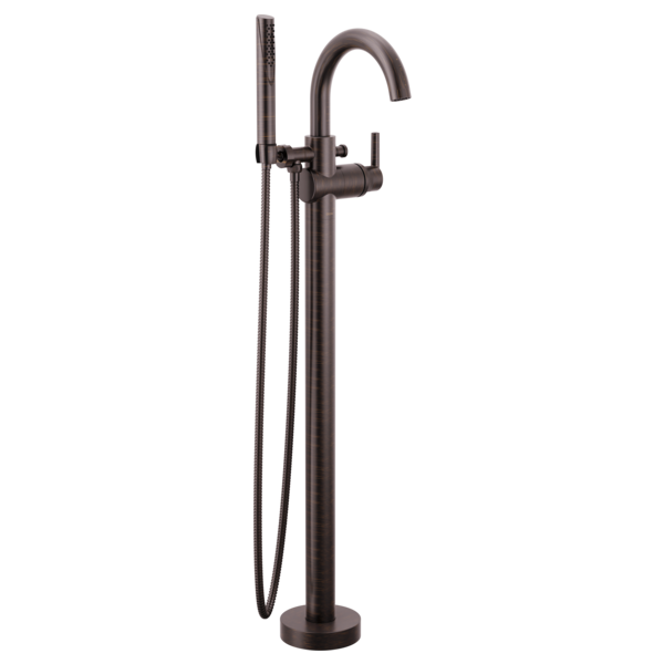 Dark bronze floor-mounted tub filler with curved spout, single handle, and detachable hand shower on hose.
