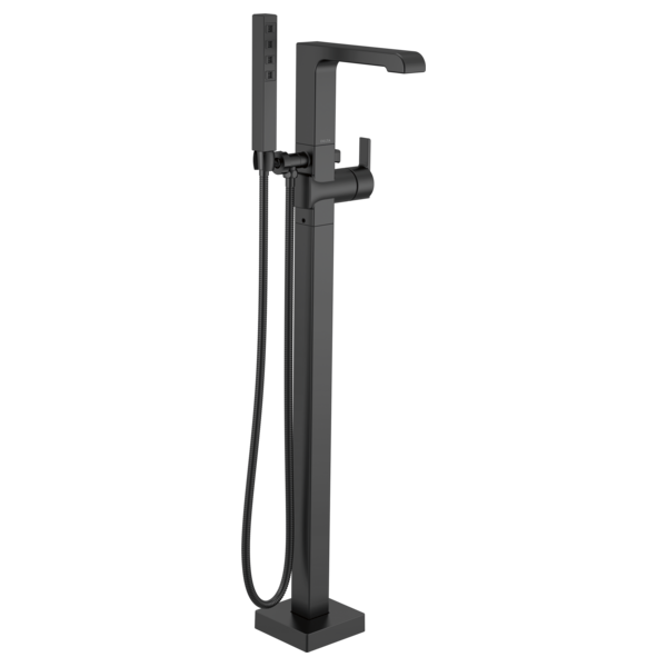 Black floor-mount tub filler with single handle, spout, and detachable hand shower on hose.
