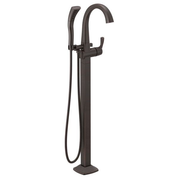 Black arc-shaped floor-mount tub filler with single lever handle and attached handheld showerhead on hose.