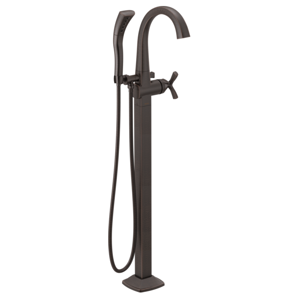Tall matte black arc tub filler with cross handles, curved spout, and detached handheld showerhead.