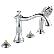 Chrome Roman tub faucet with curved spout, hand shower, and brass valve stems on white background.