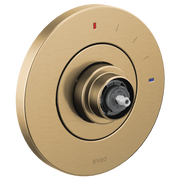 Brushed champagne bronze circular valve trim with concentric rings, central dial knob, and temperature indicator markings.