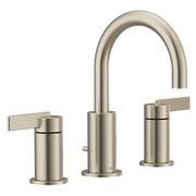 Brushed nickel three-piece bathroom faucet with arched spout and two lever handles.