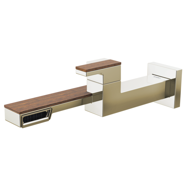 Wall-mounted lavatory faucet with single handle, brass and white finish, wood accents, and horizontal spout design.