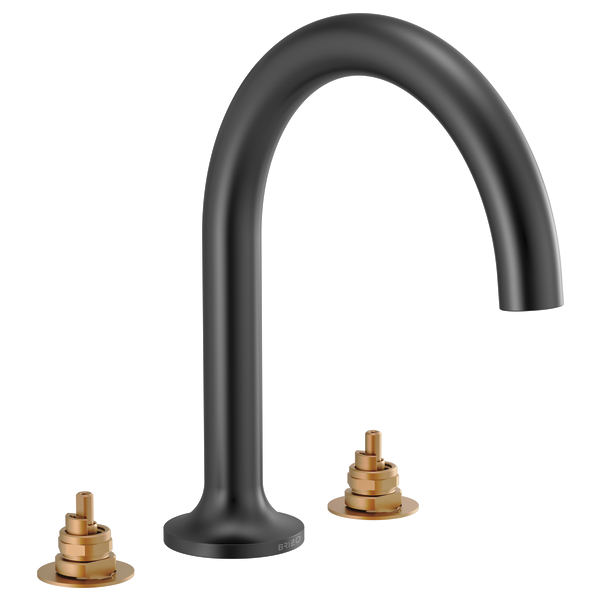 Matte black arched tub faucet with two brass valve stems and bases on either side.