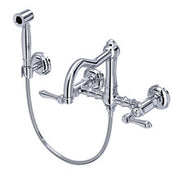 Wall-mounted bridge kitchen faucet with dual handles, spout, and detachable side spray in polished metal finish.