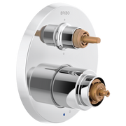 Brizo Odin white round trim plate with stacked brass valve stems and integrated diverter controls.
