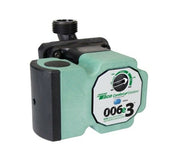 TACO 006E3 circulation pump with mint-green body, black motor housing, threaded inlet connection, and rotary dial control.