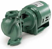 Green cast iron circulator pump with motor, inlet and outlet ports, and nameplate label.