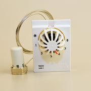 White wall-mounted dial operator with numbered settings 1-8, brass sensor bulb, and connected tubing.