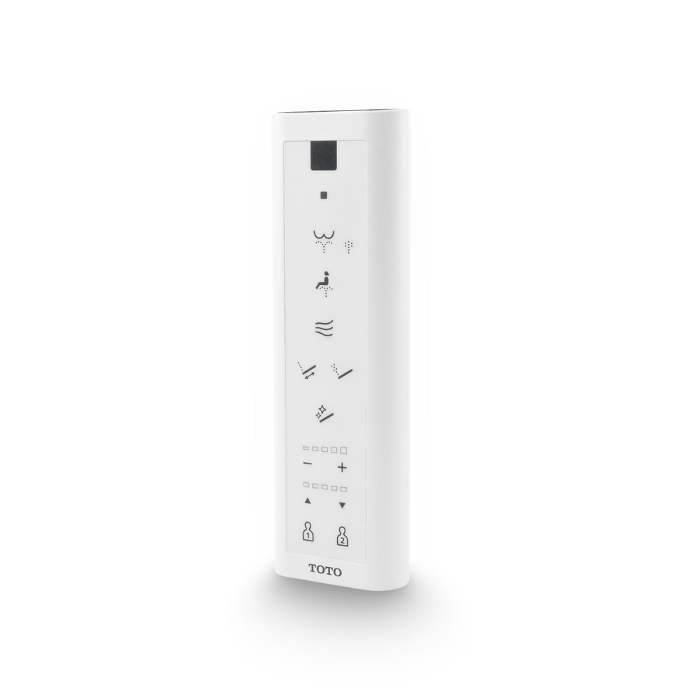 White Toto C5 remote control with multiple function buttons including water spray, heating, and seat controls.