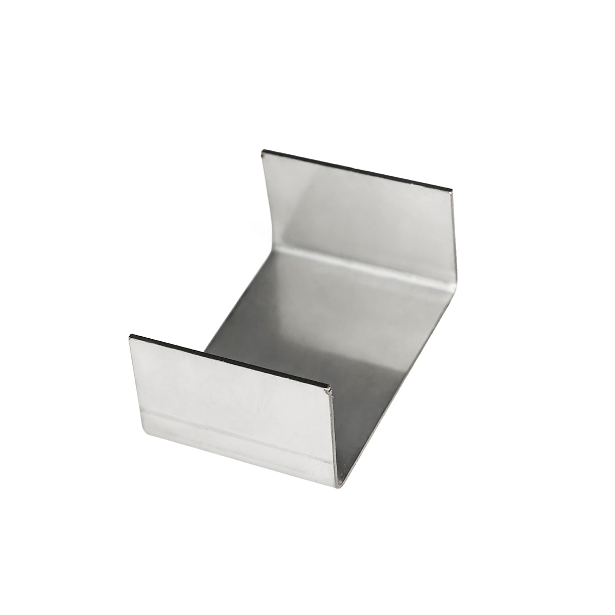 Stainless steel linear drain component with angled sides and black trim edges.