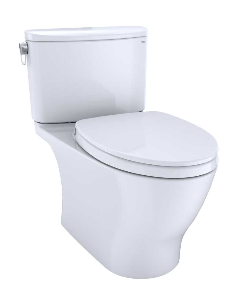 Cotton white two-piece elongated toilet with soft-close seat and separate tank with side lever.