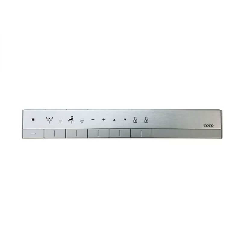 Nickel TOTO remote control with function buttons including water spray, temperature, and lock controls.