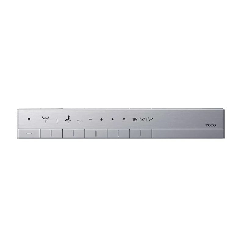 Silver Toto remote control with multiple function buttons and symbols for toilet seat operations.