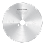 Circular saw blade with fine teeth around edges, central mounting hole, and Freud branding on silver metal surface.